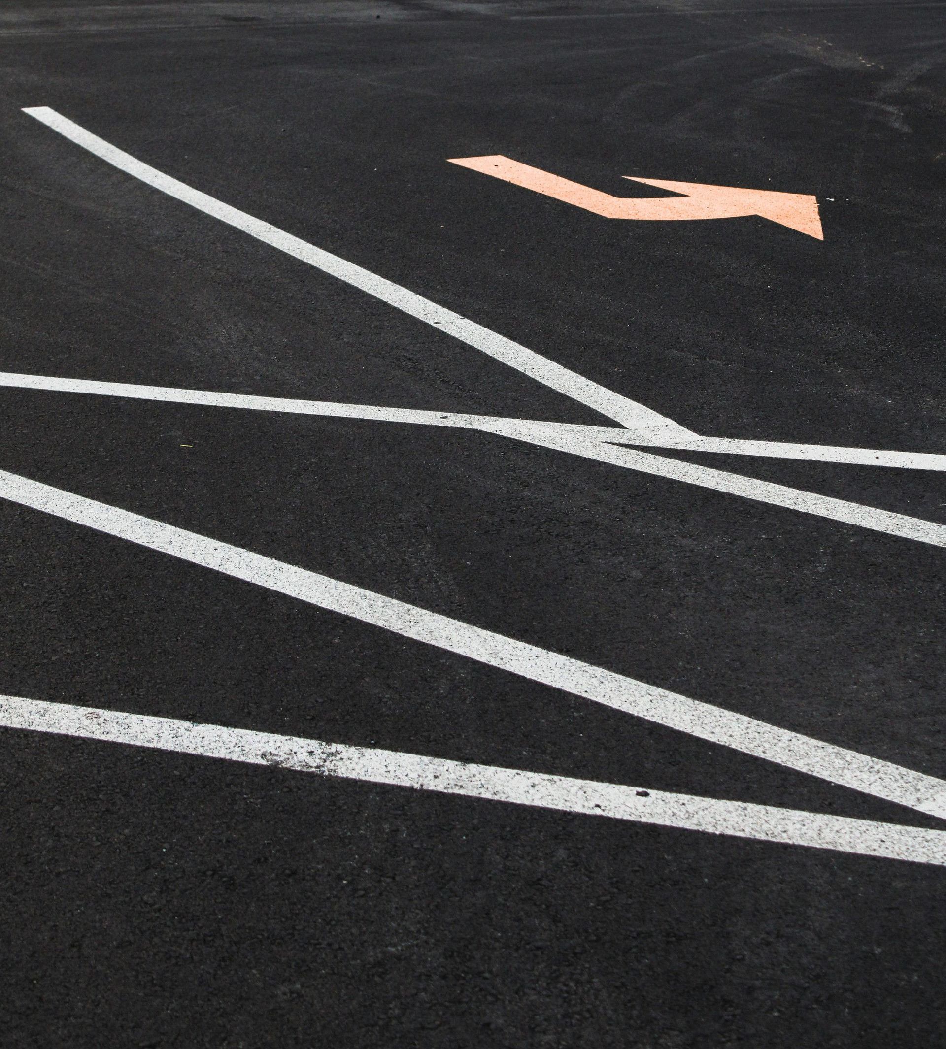 an empty parking lot with no cars in it